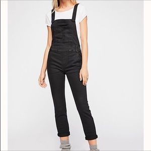 Free People black skinny overalls